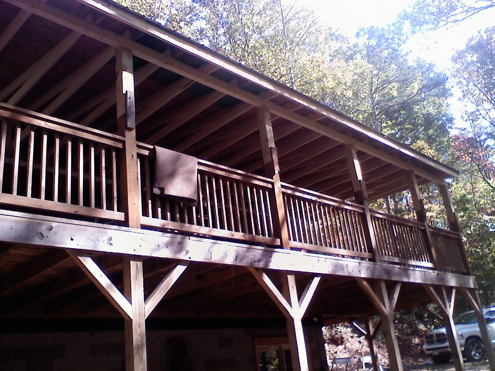 Timber framing under a new elevated porch and deck — Roof Leak Repair in Pepperell by Roofing Brothers